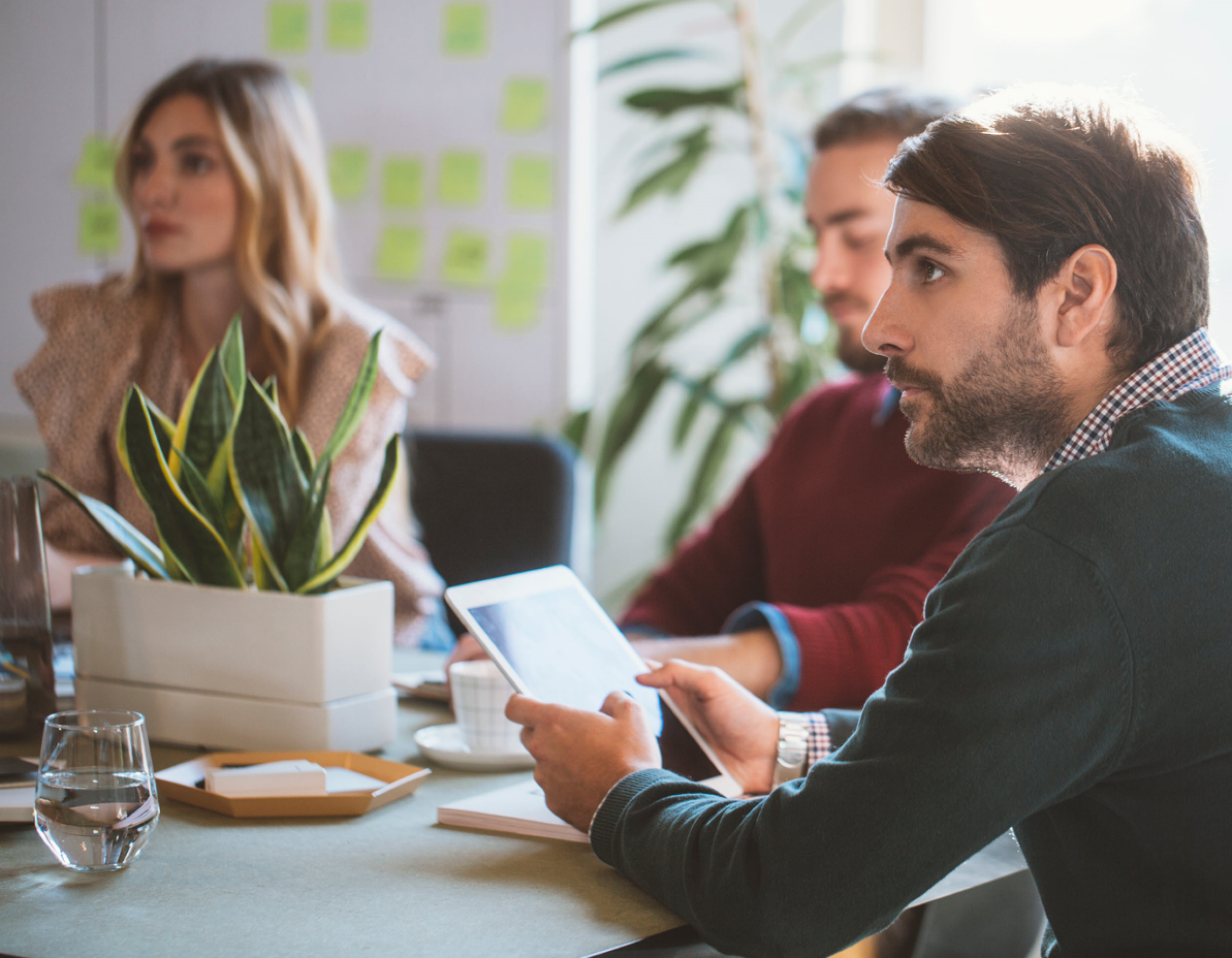 3-business-people-in-meeting.